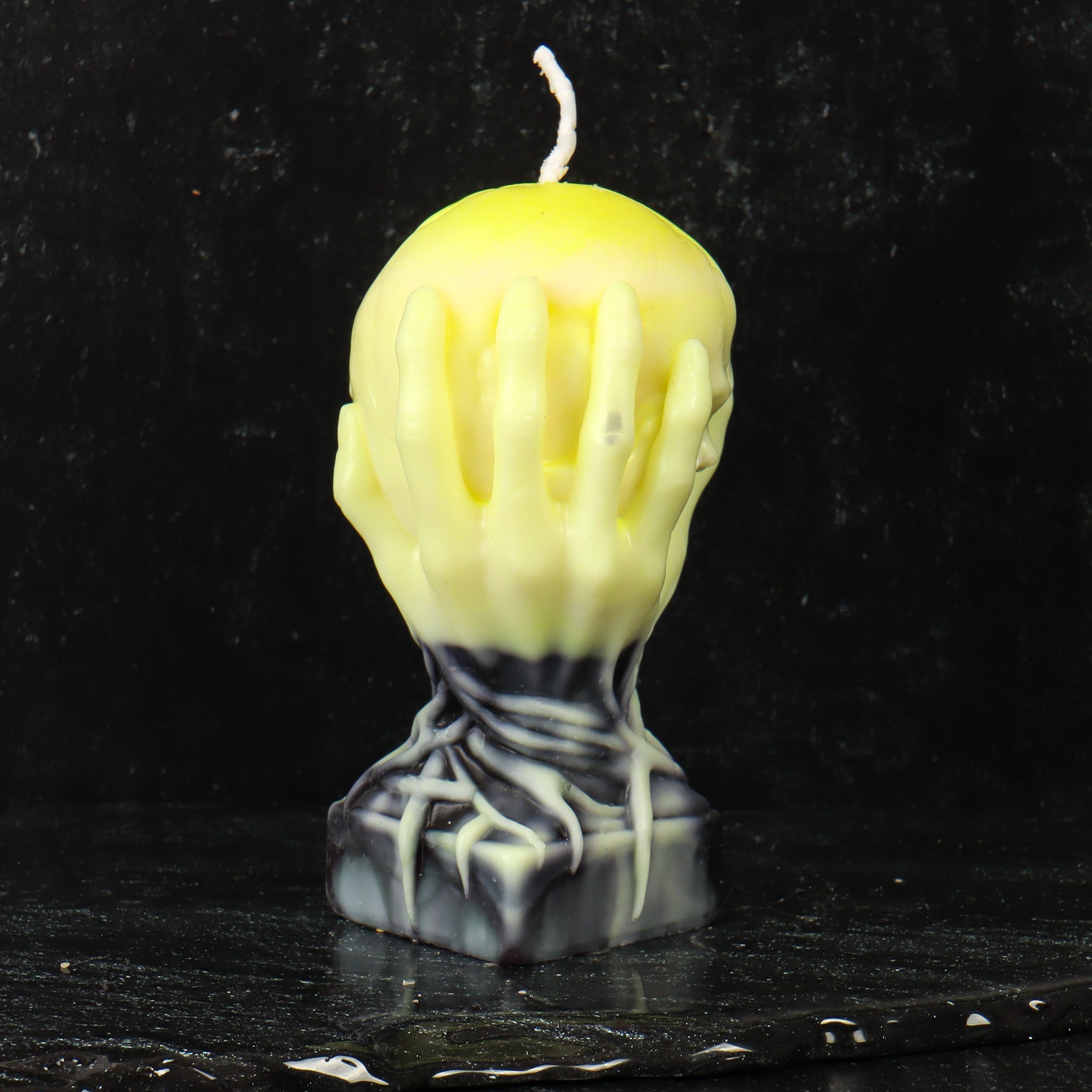 Skull in Hands Candle