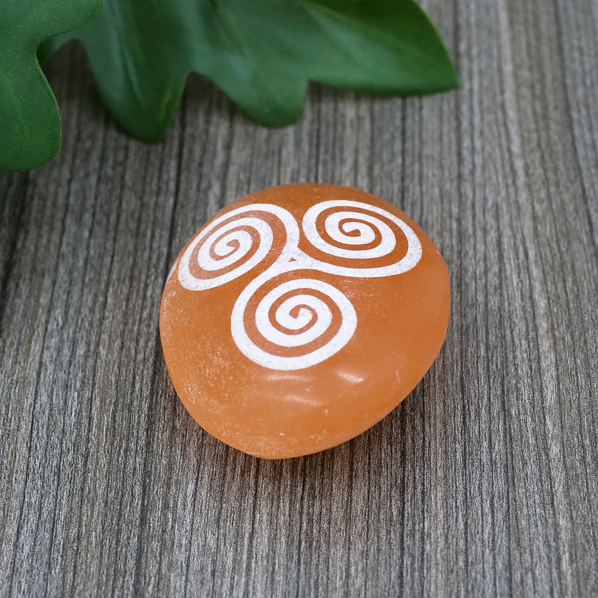 Etched Peach Selenite Palm Stone Crystal Palm Stones Aquarius Triskelion