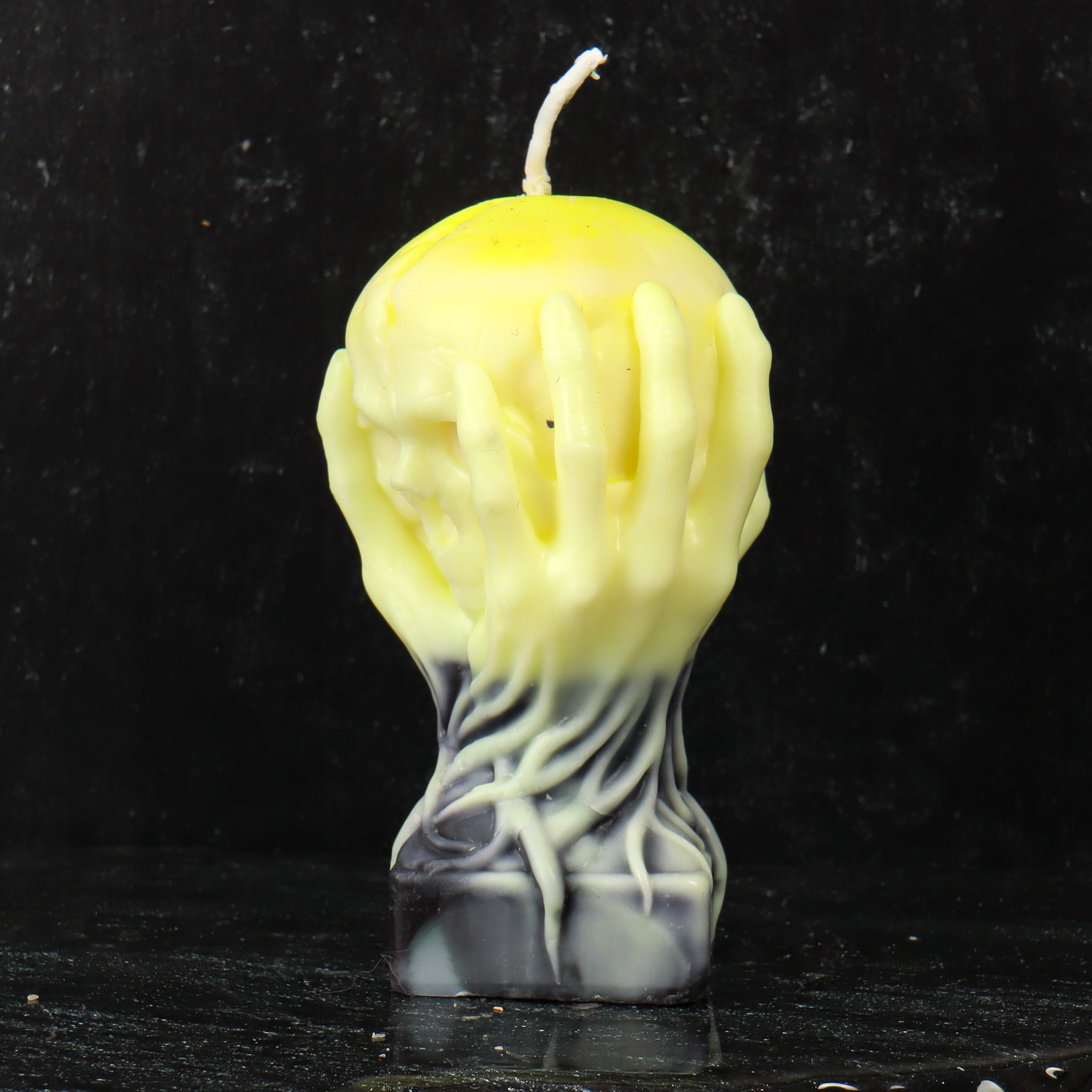 Skull in Hands Candle