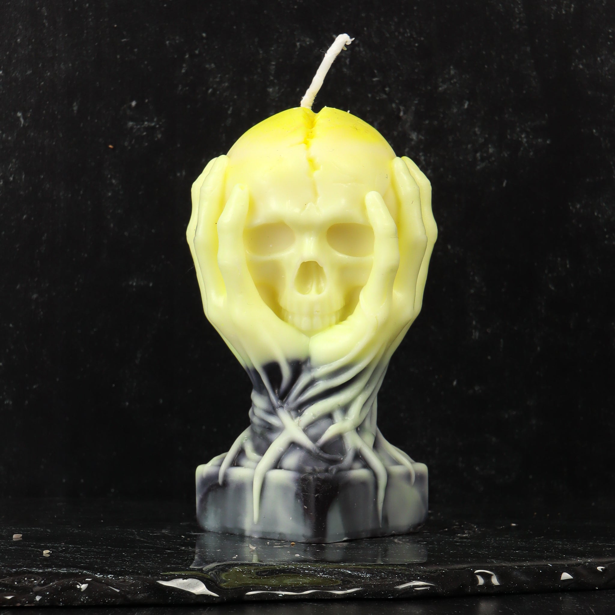 Skull in Hands Candle